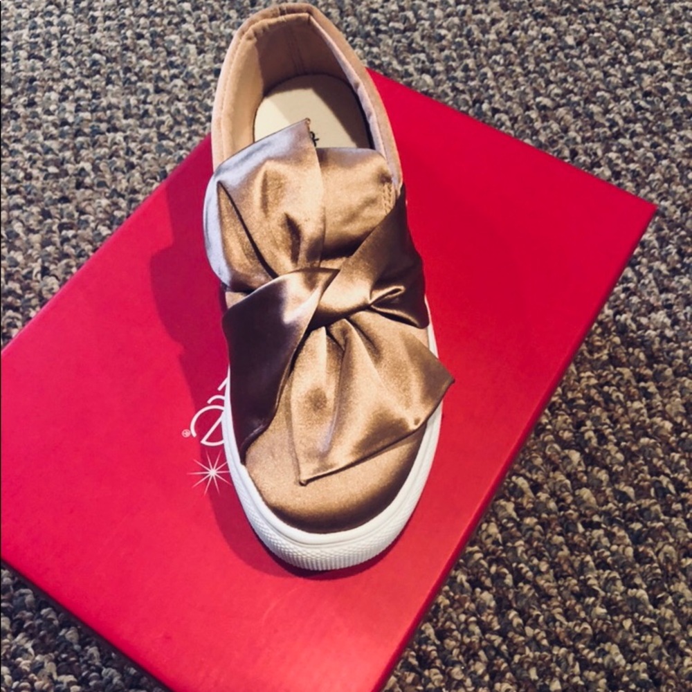 Blush slip on shoes! Runs small!